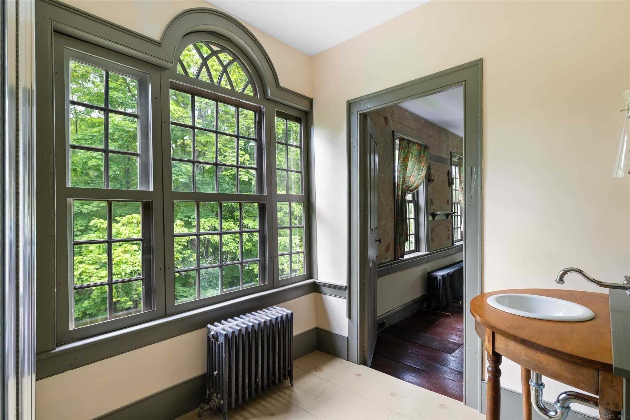89 John Perry Road Eastford, CT 06242 - Photo 36 of 40 a view of a hallway with wooden floor and furniture