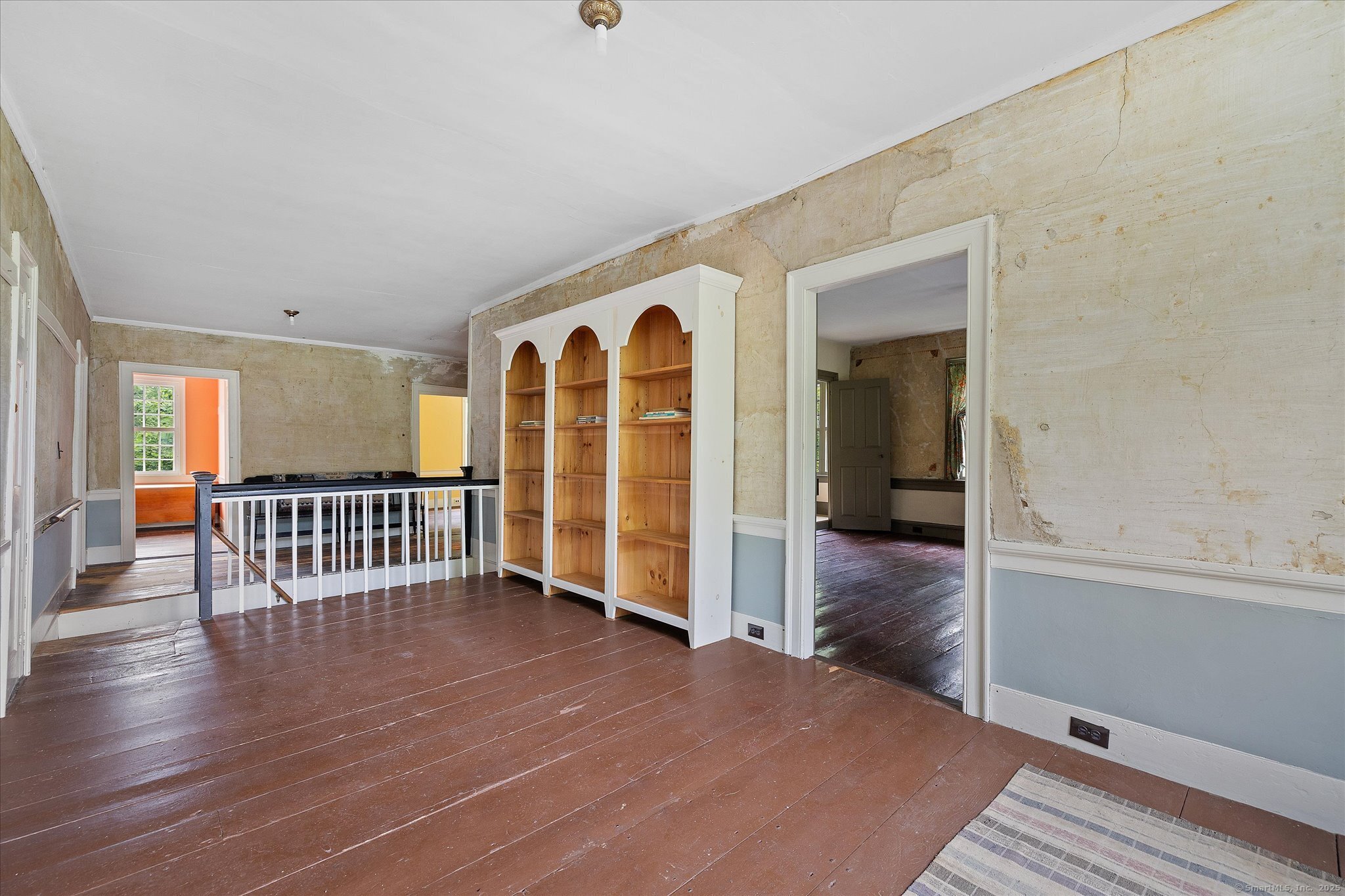 89 John Perry Road Eastford, CT 06242 - Photo 5 of 40 an empty room with wooden floor and windows