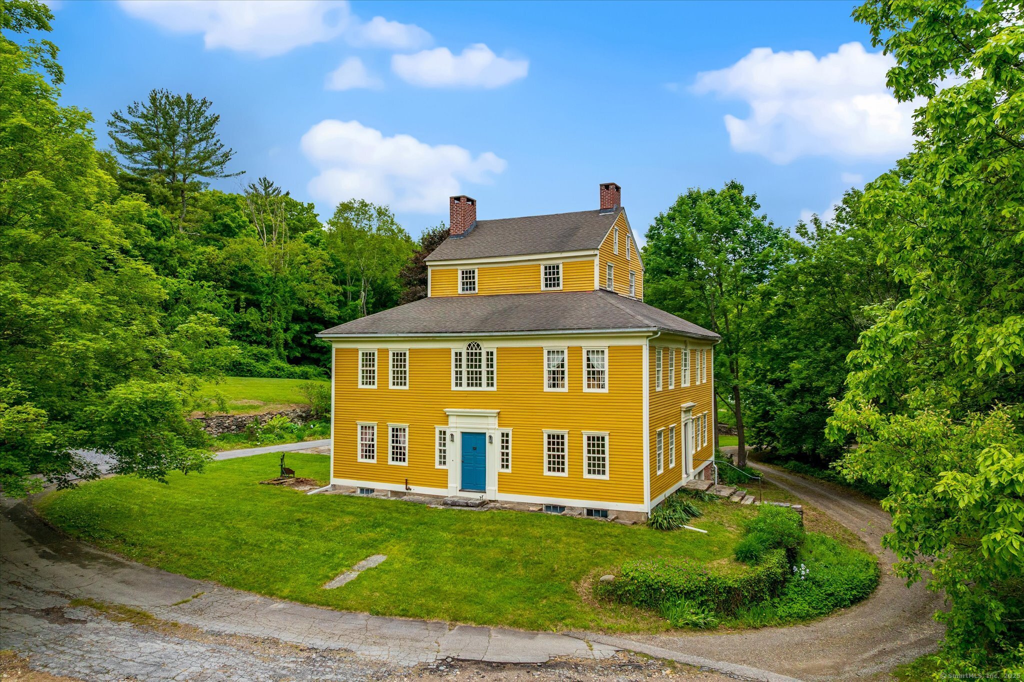 89 John Perry Road Eastford, CT 06242 - Photo 9 of 40 a front view of a house with a yard