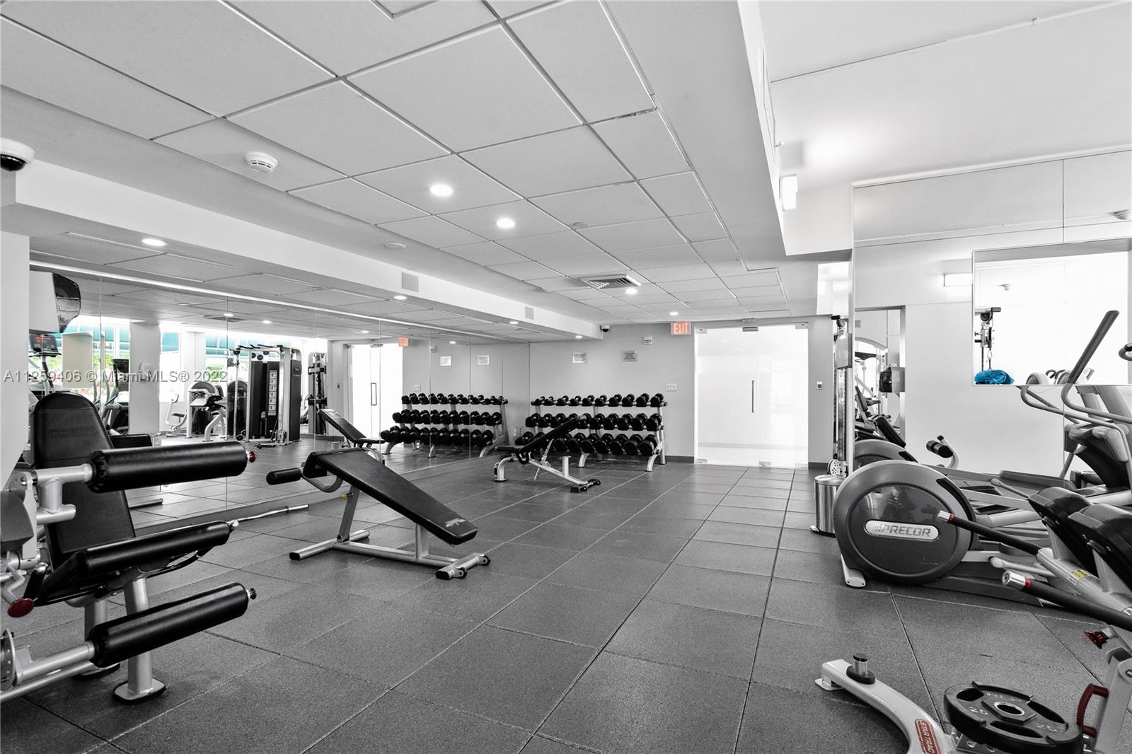888 Brickell Key Drive, Unit 2610 Miami, FL 33131 - Photo 27 of 31 a view of a room with gym equipment