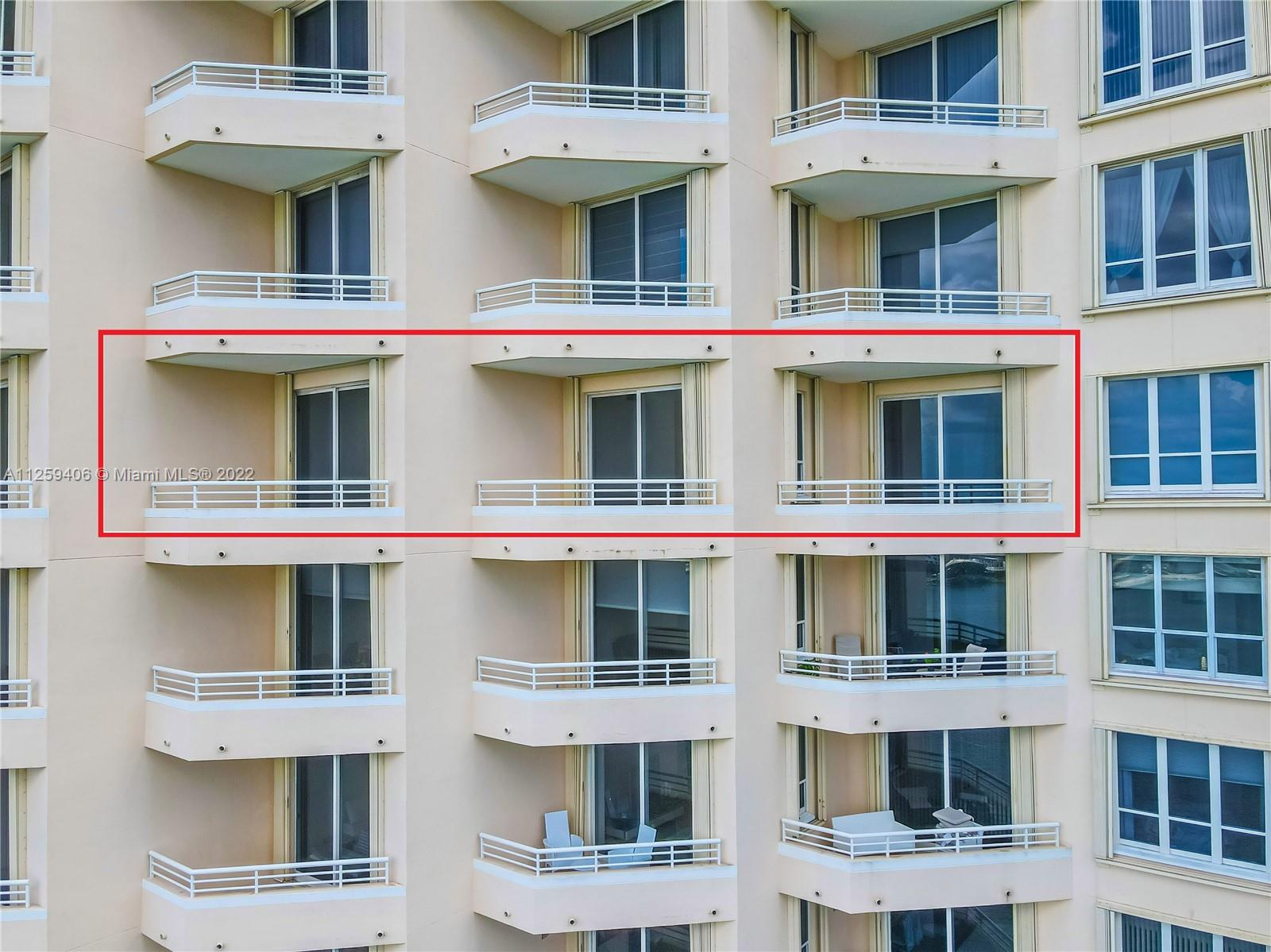 888 Brickell Key Drive, Unit 2610 Miami, FL 33131 - Photo 5 of 31 a view of a building with a lot of windows