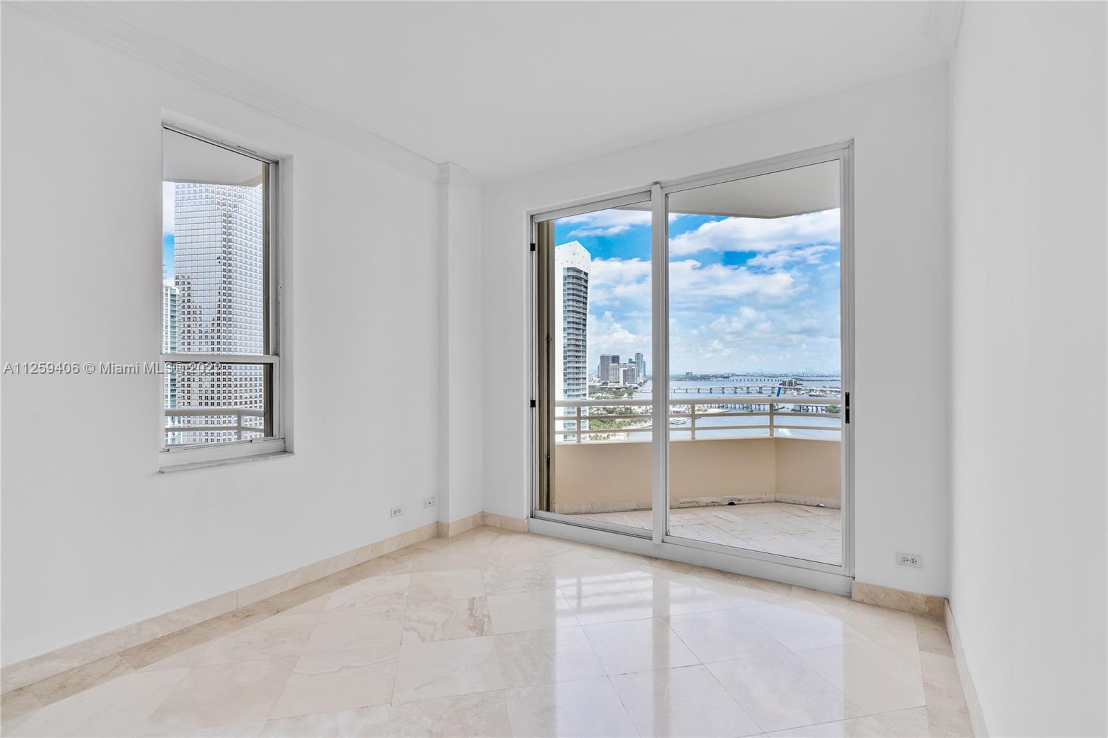 888 Brickell Key Drive, Unit 2610 Miami, FL 33131 - Photo 7 of 31 a view of an empty room and window