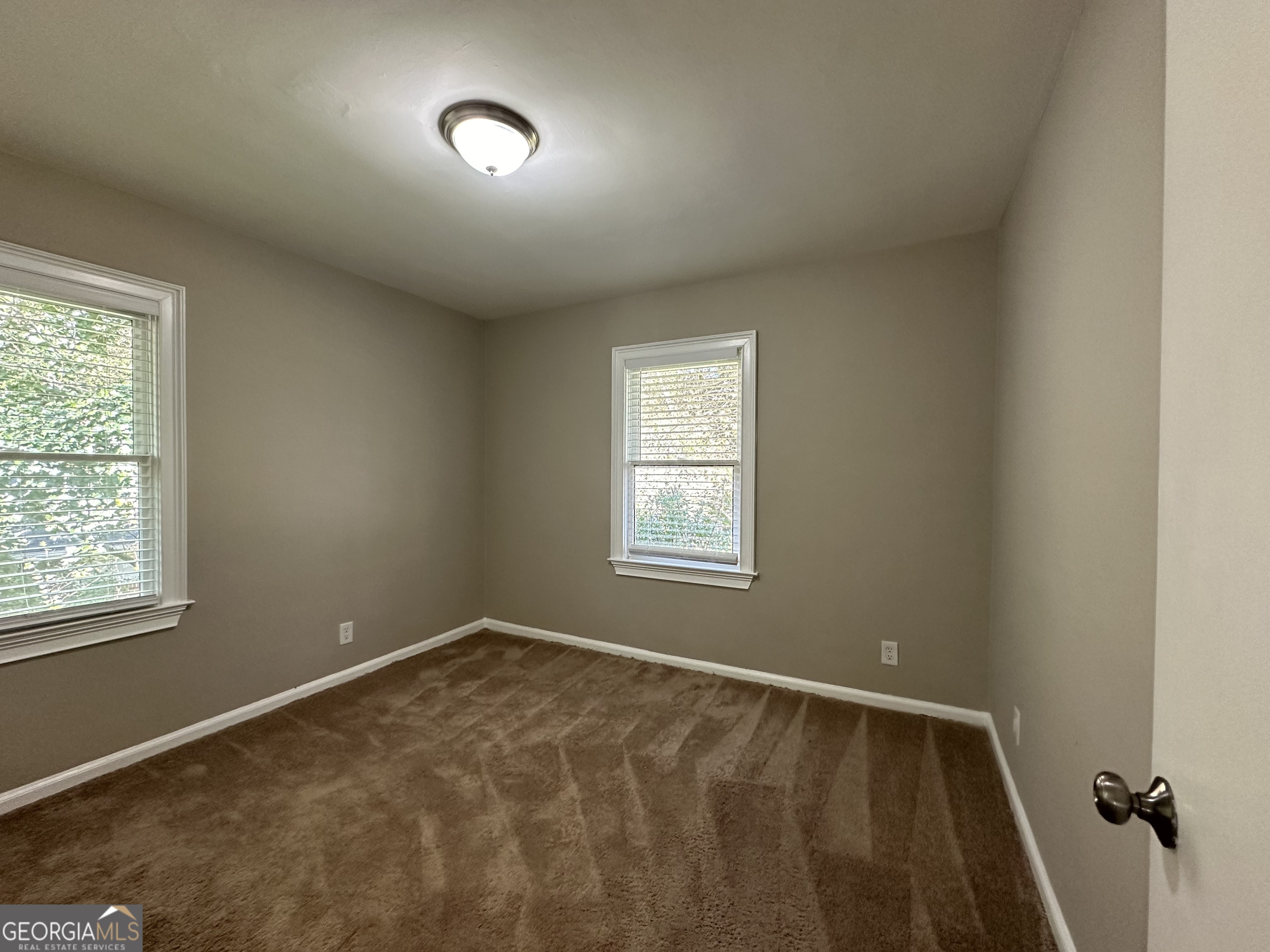 2164 Rockhaven Circle Decatur, GA 30032 - Photo 12 of 17 an empty room with a window