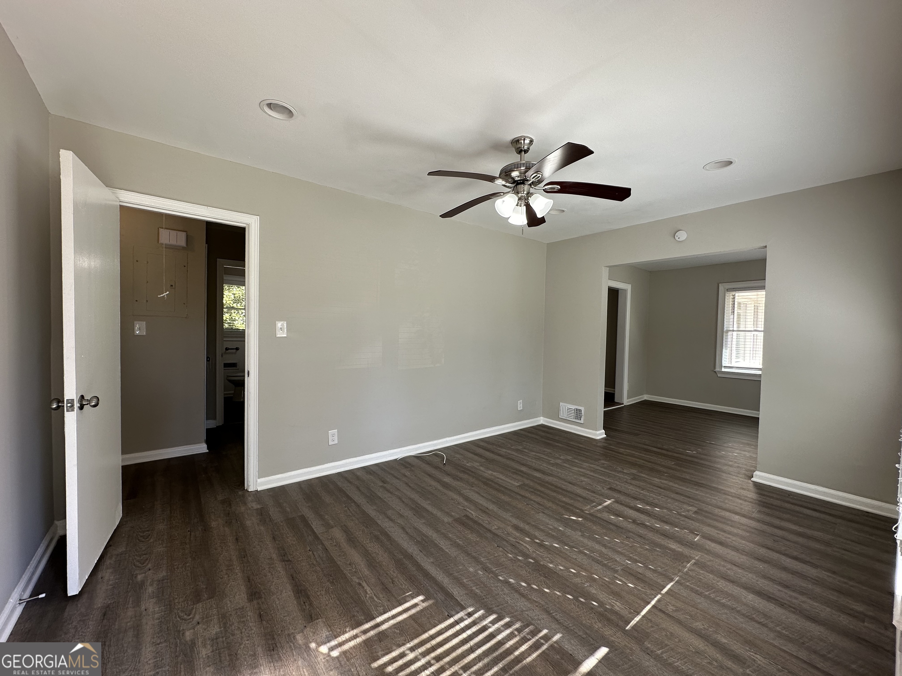 2164 Rockhaven Circle Decatur, GA 30032 - Photo 3 of 17 wooden floor in an empty room with a window