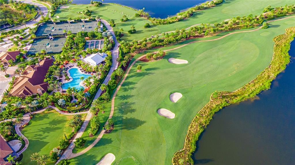 9419 Benvenuto Court, Unit 204 Naples, FL 34119 - Photo 2 of 50 Bird's eye view of a nearby body of water and a golf club