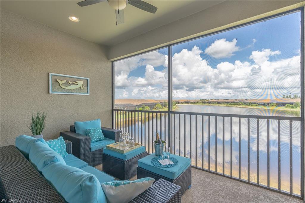9419 Benvenuto Court, Unit 204 Naples, FL 34119 - Photo 34 of 50 Sunroom featuring a water view