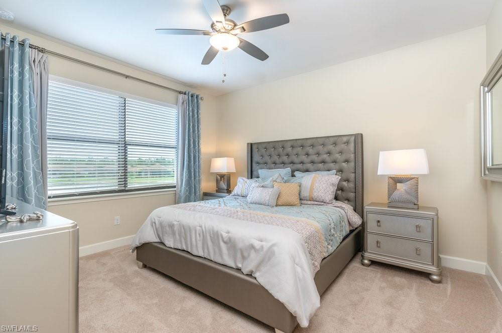 9419 Benvenuto Court, Unit 204 Naples, FL 34119 - Photo 38 of 50 Bedroom featuring light colored carpet and ceiling fan
