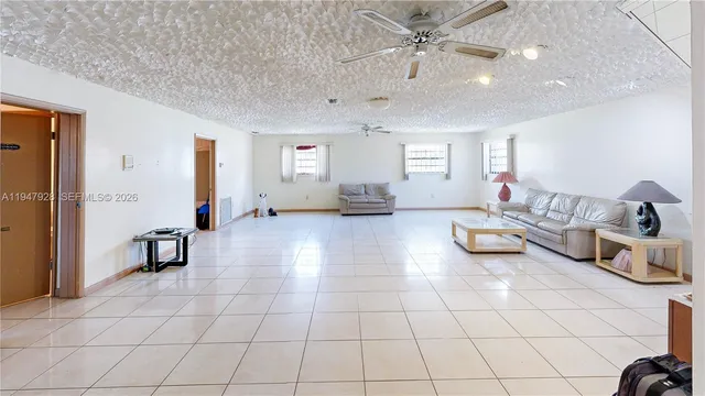 a bathroom with a shower and a mirror