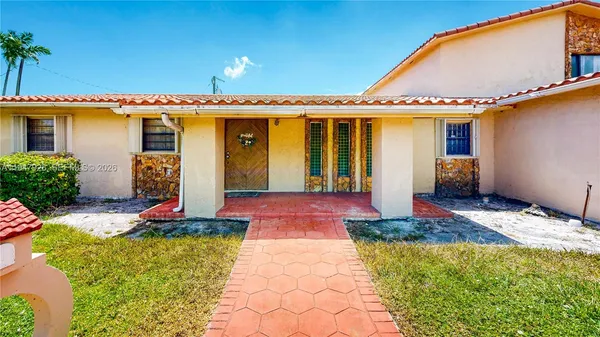 a front view of a house with entertaining space