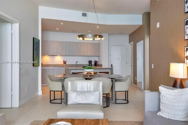 a bathroom that has a glass shower door