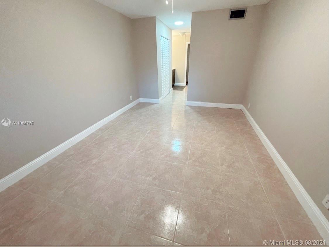 6700 Cypress Road, Unit 105 Plantation, FL 33317 - Photo 18 of 26 a view of an empty room