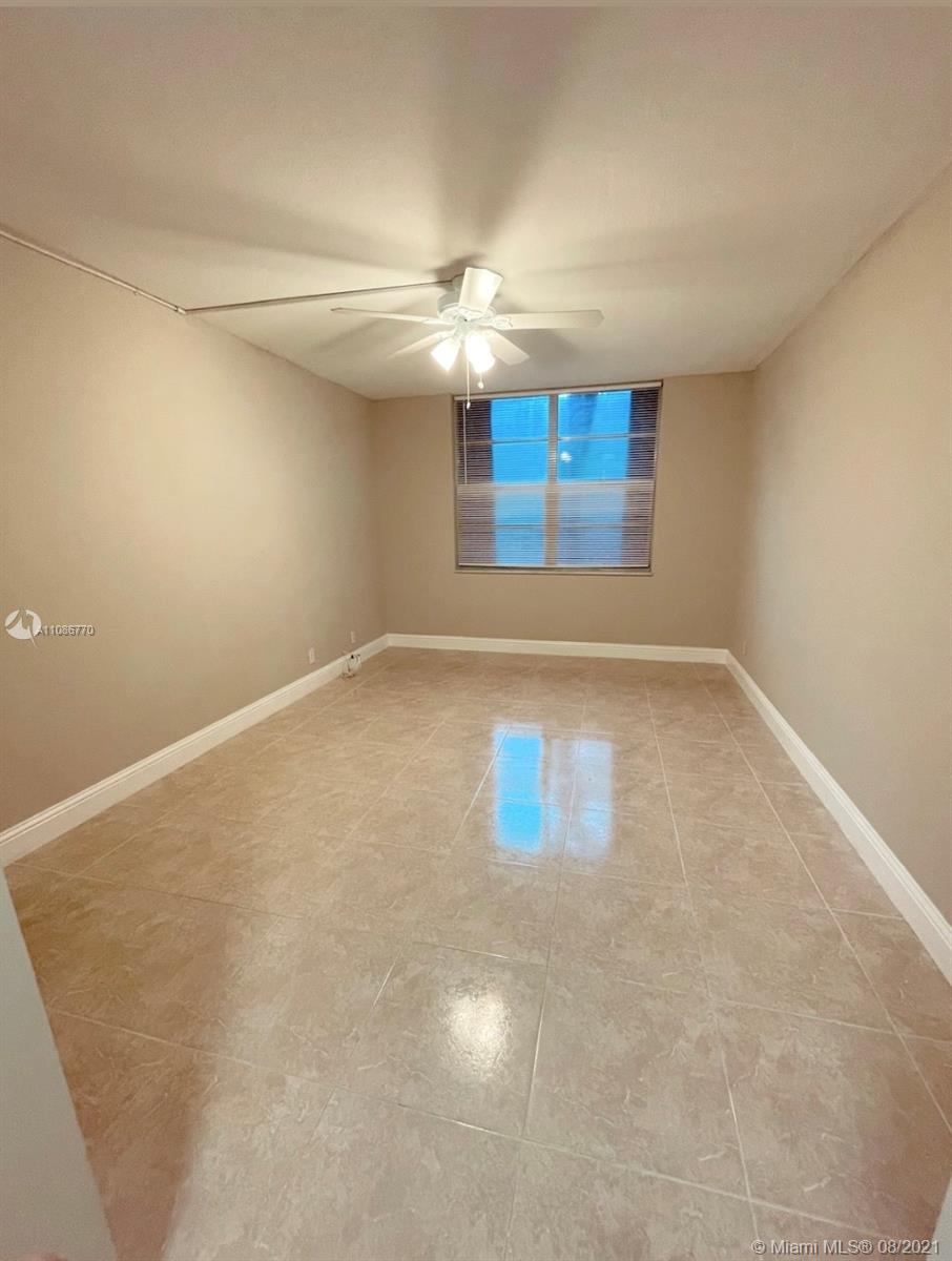 6700 Cypress Road, Unit 105 Plantation, FL 33317 - Photo 19 of 26 a view of an empty room