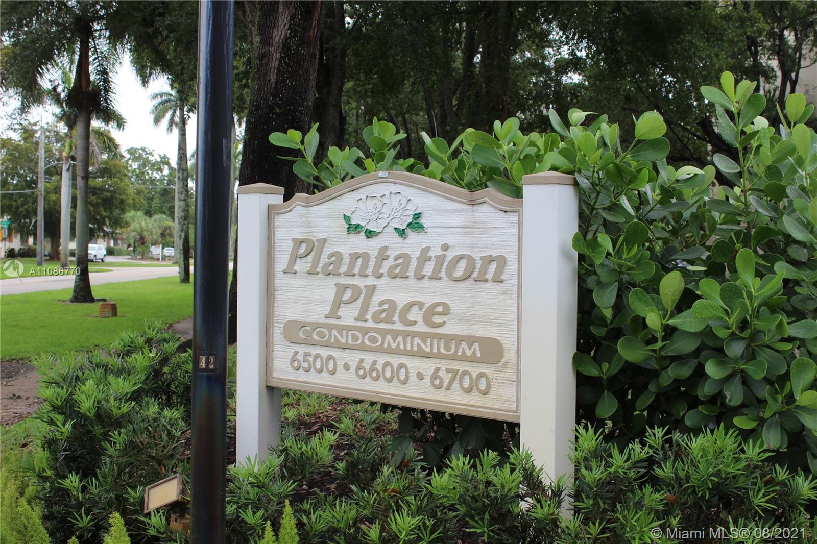 6700 Cypress Road, Unit 105 Plantation, FL 33317 - Photo 25 of 26 a sign on the side of the road