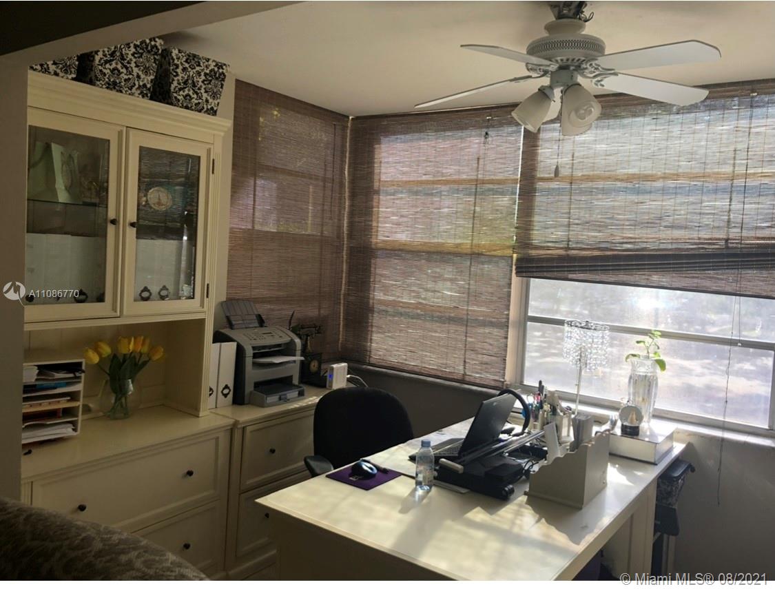 6700 Cypress Road, Unit 105 Plantation, FL 33317 - Photo 8 of 26 a kitchen with a sink a stove and a window