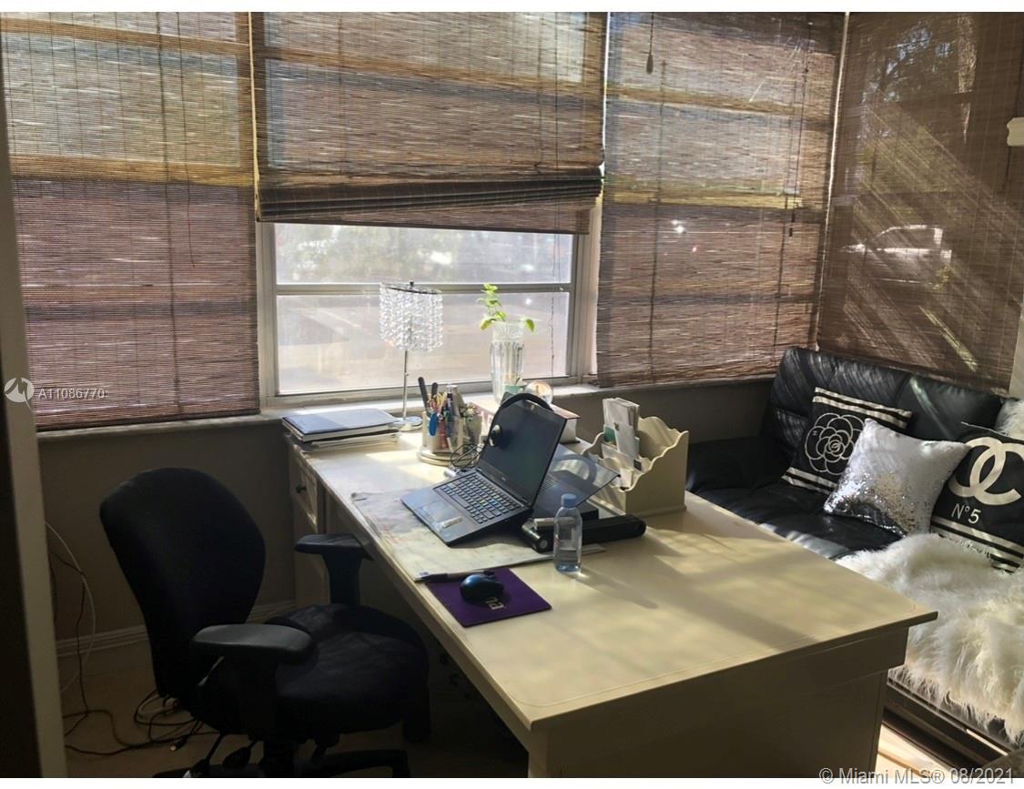 6700 Cypress Road, Unit 105 Plantation, FL 33317 - Photo 9 of 26 a view of a workspace with furniture