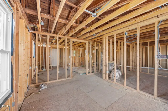 a view of a room with wooden walls