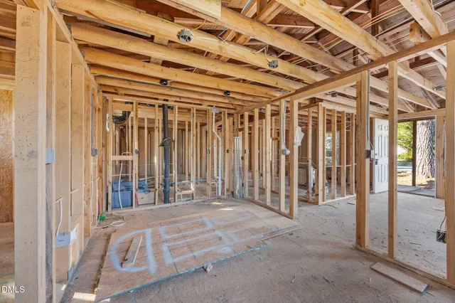 a view of a room with wooden walls
