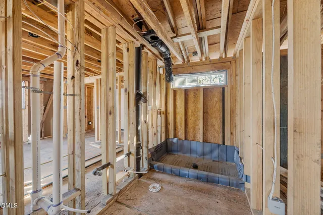 a view of entry way with wooden floor