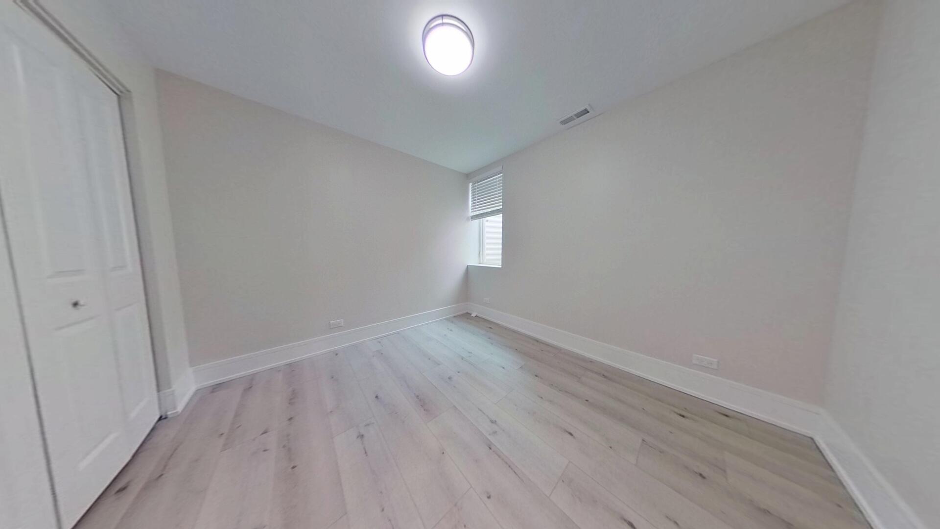4000 Forest Avenue, Unit 2 Brookfield, IL 60513 - Photo 13 of 15 a view of wooden floor and windows in a room