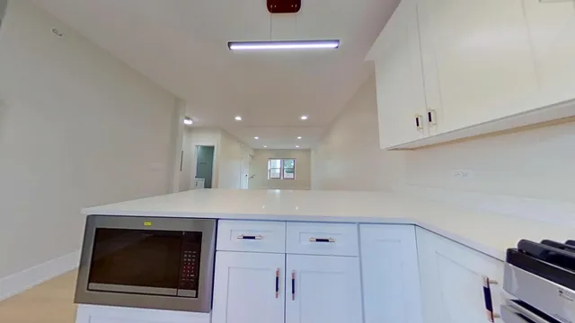 a view of a hallway with entryway