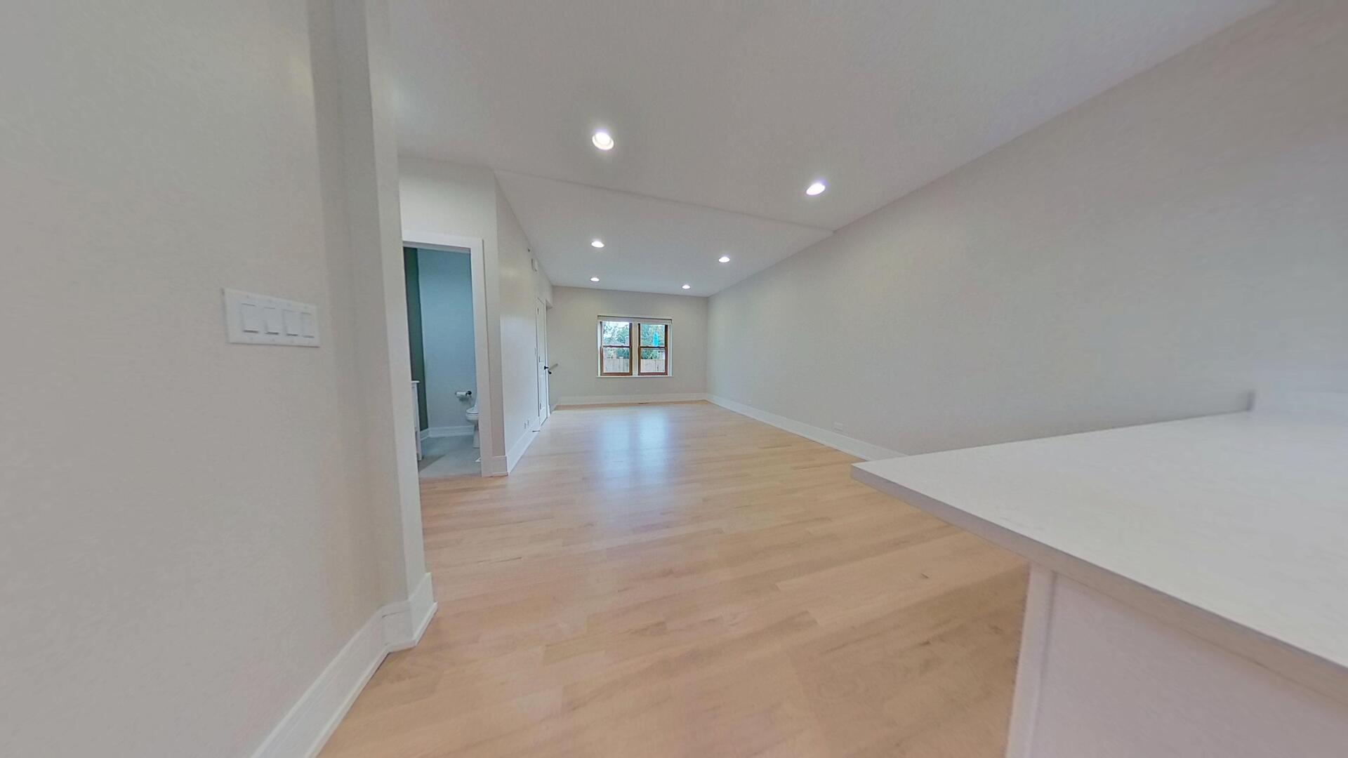 4000 Forest Avenue, Unit 2 Brookfield, IL 60513 - Photo 4 of 15 en empty room with wooden floor