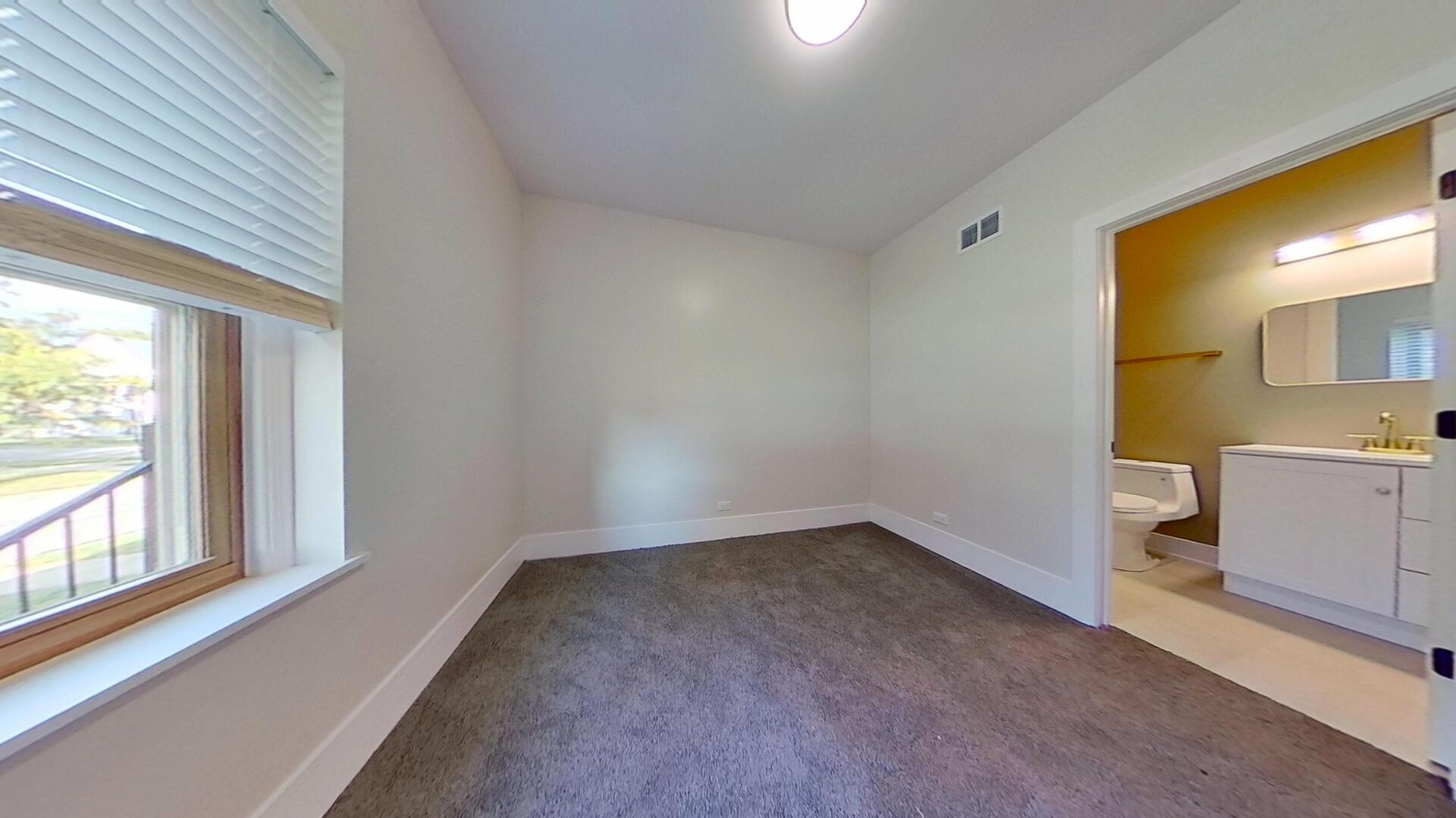 4000 Forest Avenue, Unit 2 Brookfield, IL 60513 - Photo 8 of 15 a view of a kitchen with a sink and cabinet