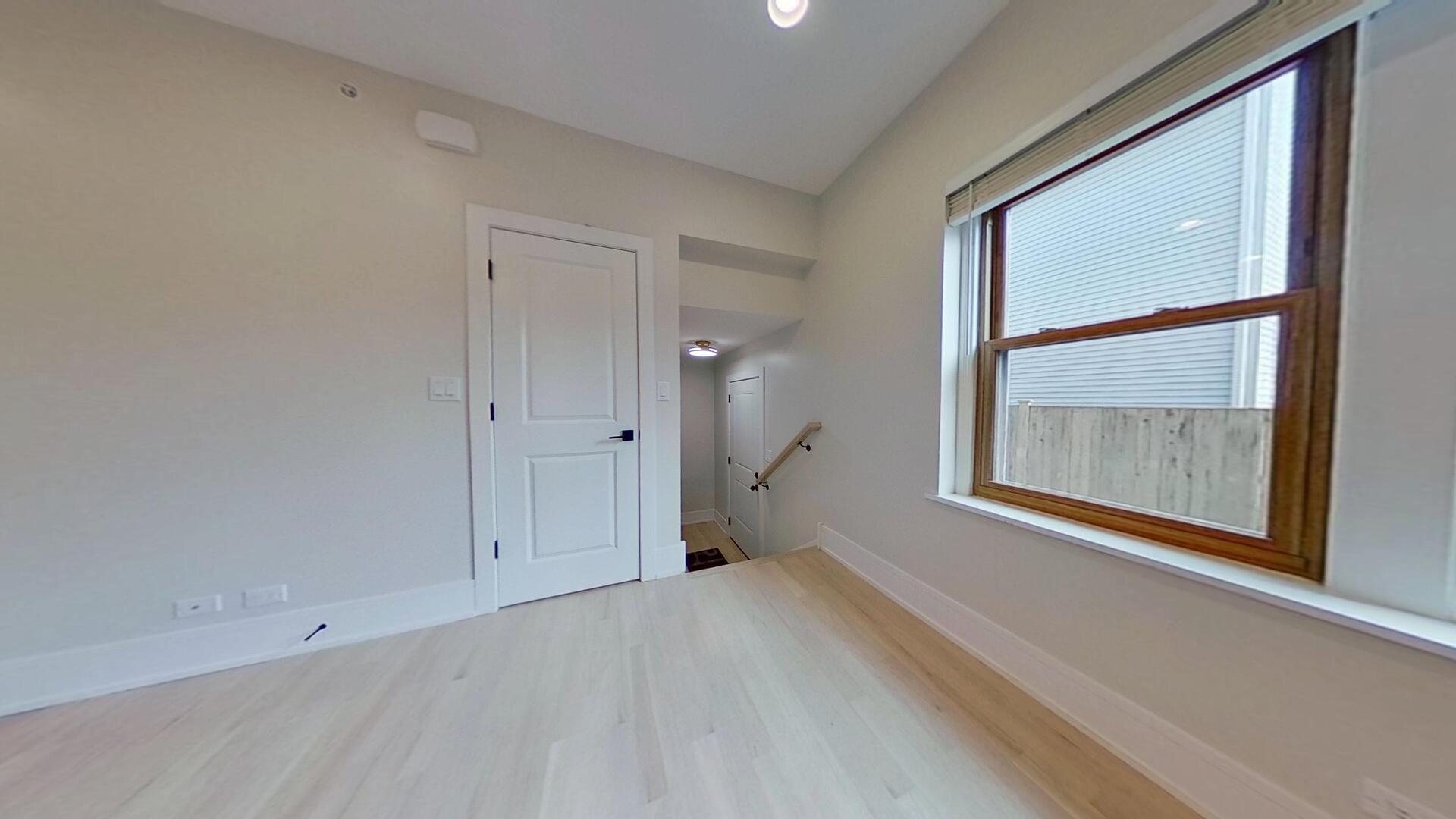 4000 Forest Avenue, Unit 2 Brookfield, IL 60513 - Photo 10 of 15 a view of an empty room with a window