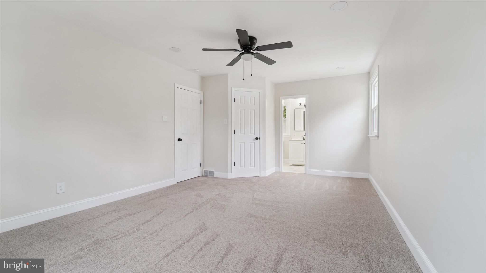 21 Fairview Road Springfield, PA 19064 - Photo 19 of 25 a view of an empty room with a ceiling fan