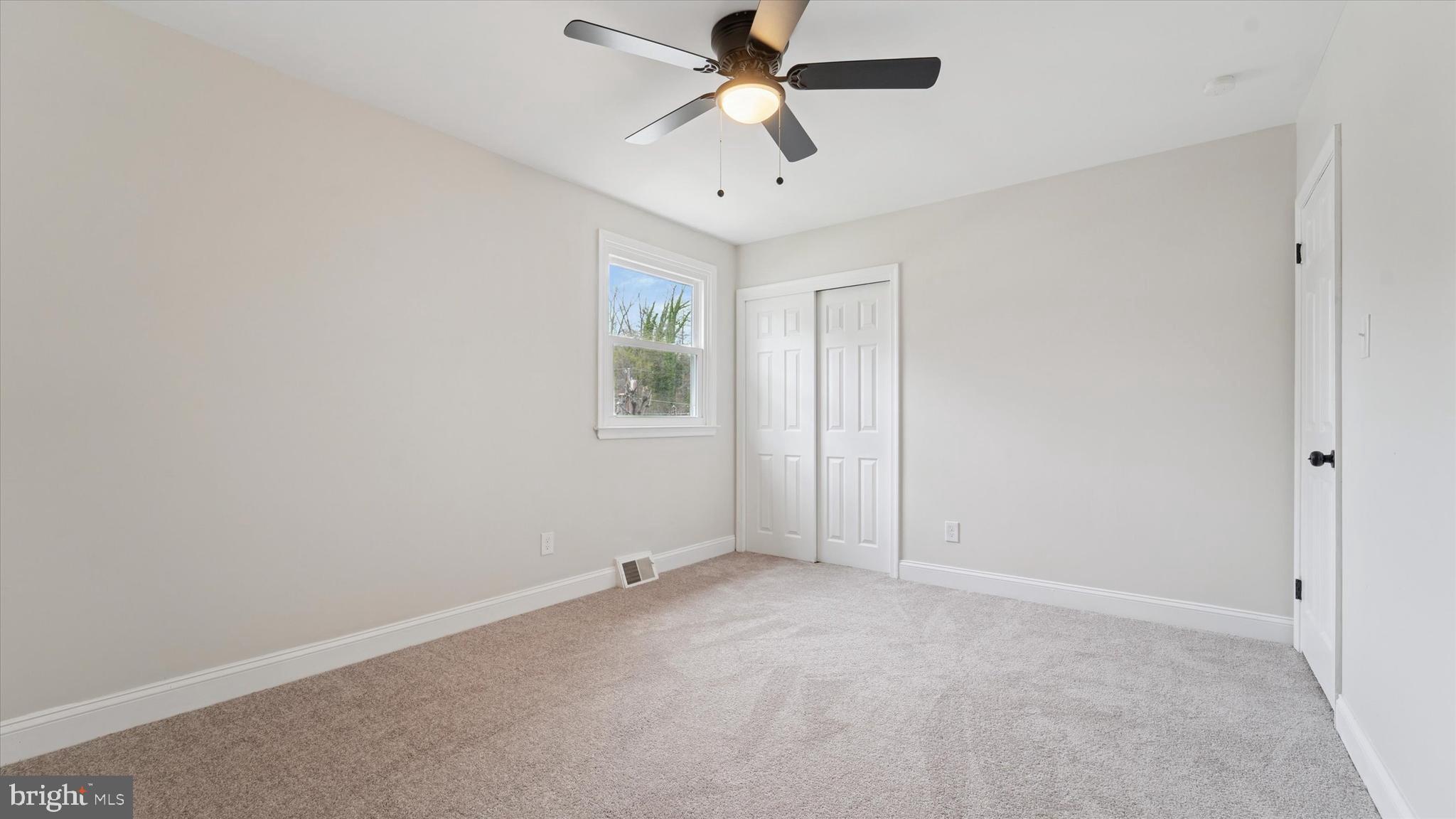 21 Fairview Road Springfield, PA 19064 - Photo 23 of 25 an empty room with windows and fan