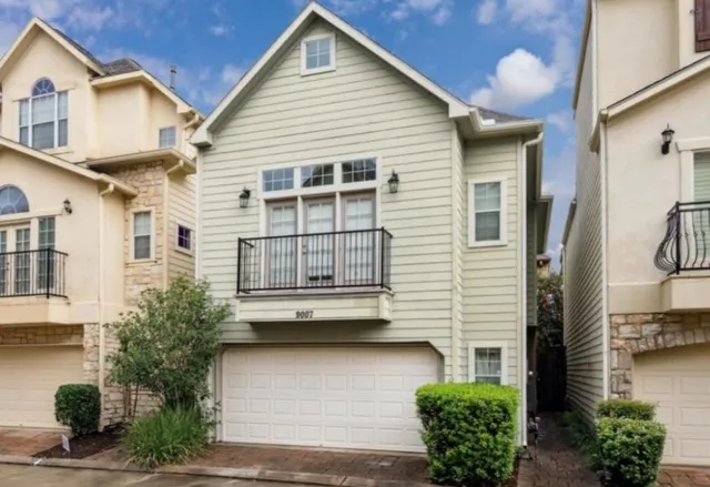 a view of a house with a balcony