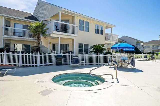 aerial view of a house with a swimming pool