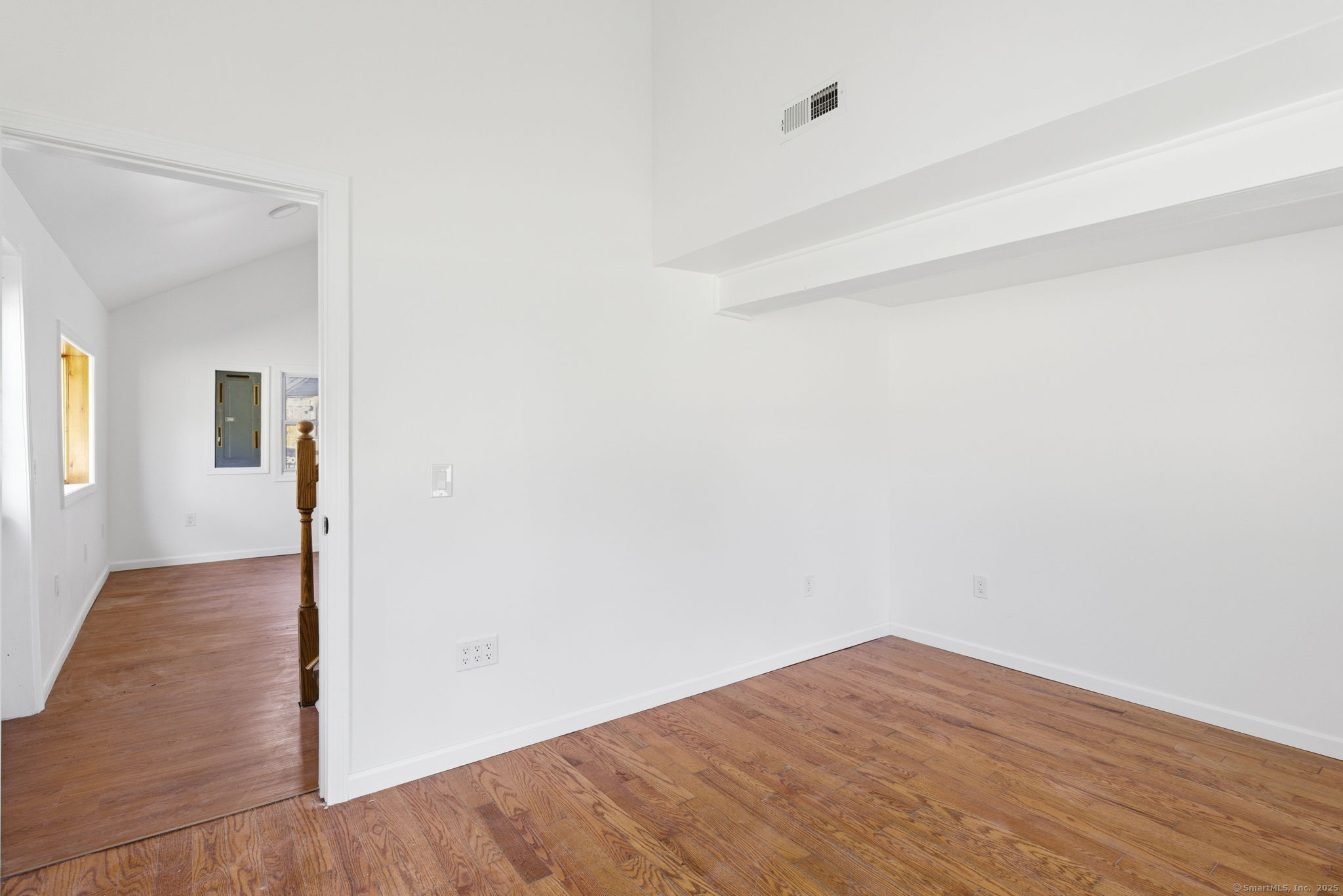 18 Pautipaug Hill Road Baltic, CT 06330 - Photo 19 of 35 a view of empty room with wooden floor