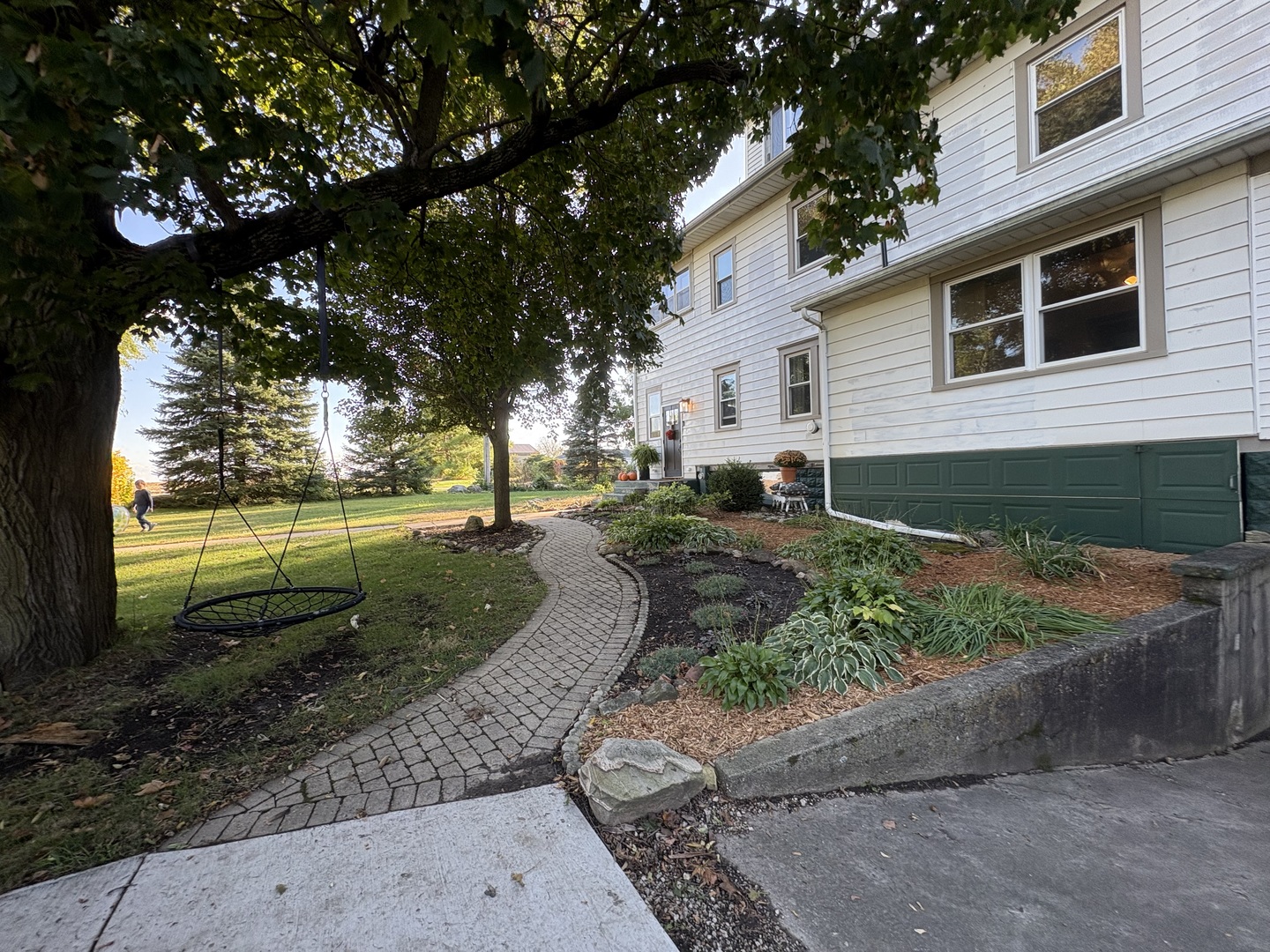 2306 Beach Road Ashton, IL 61006 - Photo 54 of 56 a view of a yard with plants and trees