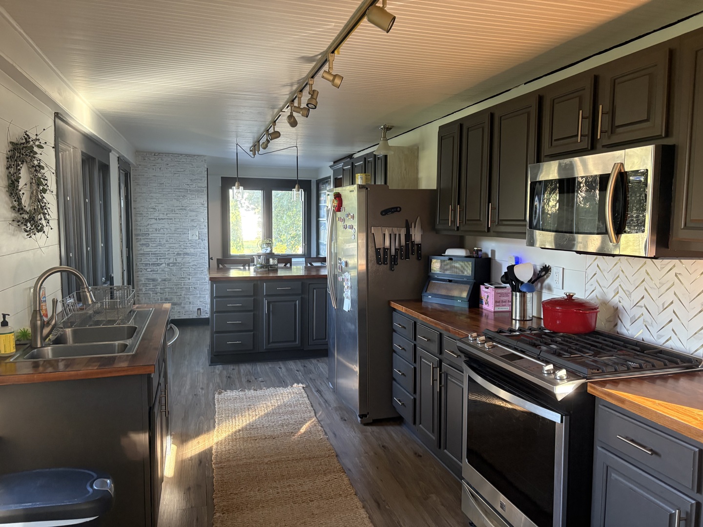 2306 Beach Road Ashton, IL 61006 - Photo 10 of 56 a kitchen with a stove and a sink