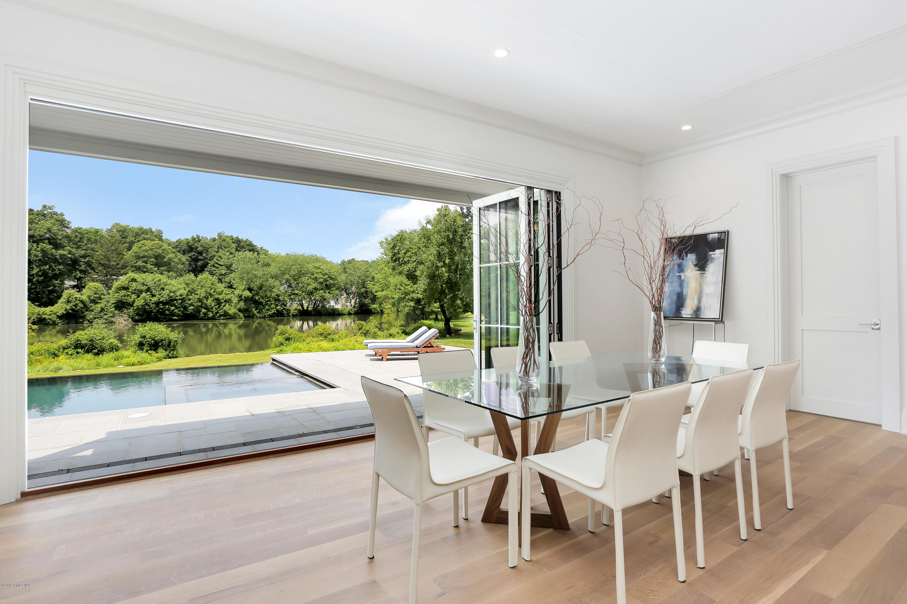 38 Birch Lane Greenwich, CT 06830 - Photo 11 of 31 a view of a dining room with furniture window and outside view