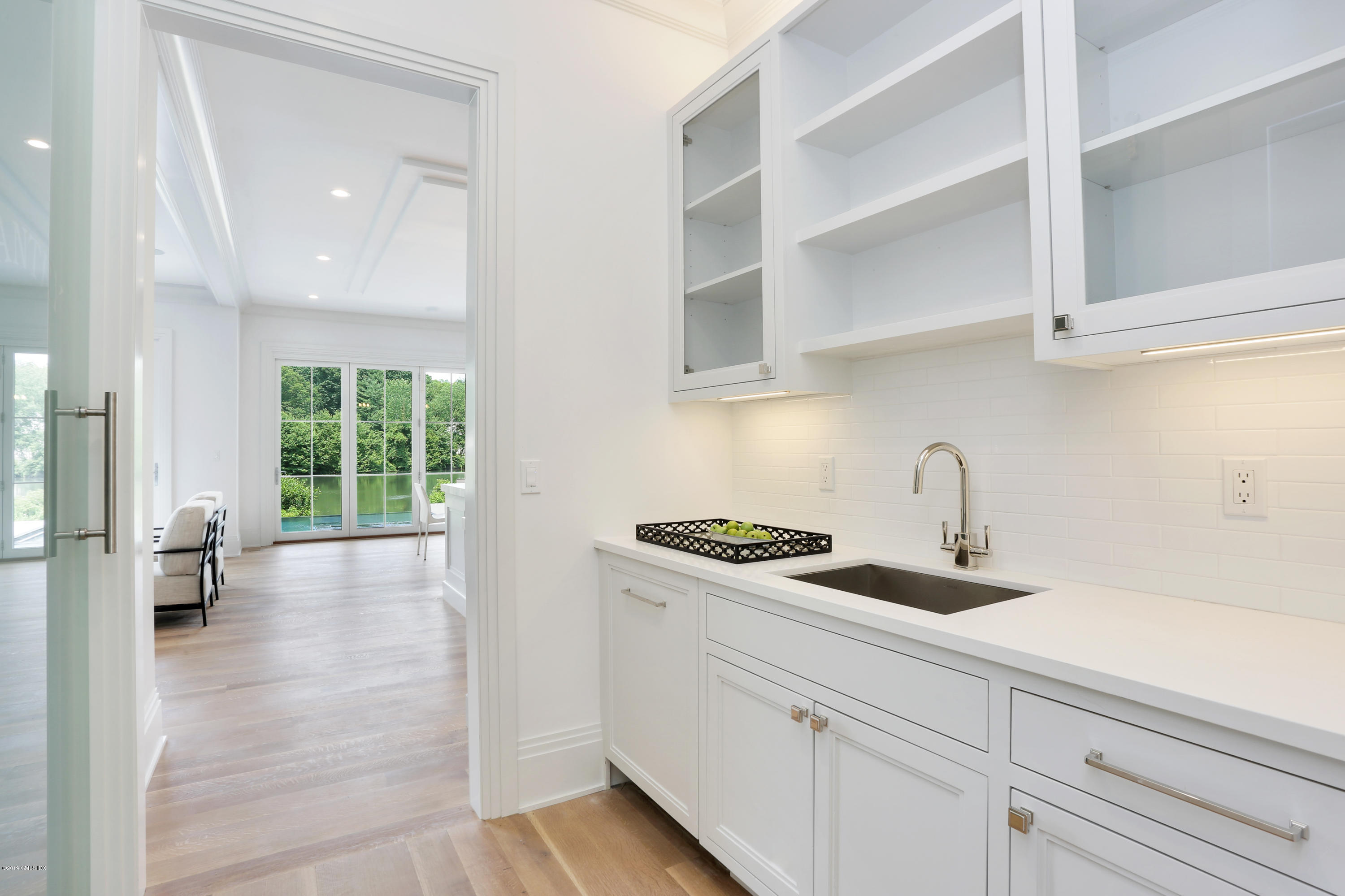 38 Birch Lane Greenwich, CT 06830 - Photo 13 of 31 a kitchen with stainless steel appliances granite countertop a sink a stove and cabinets