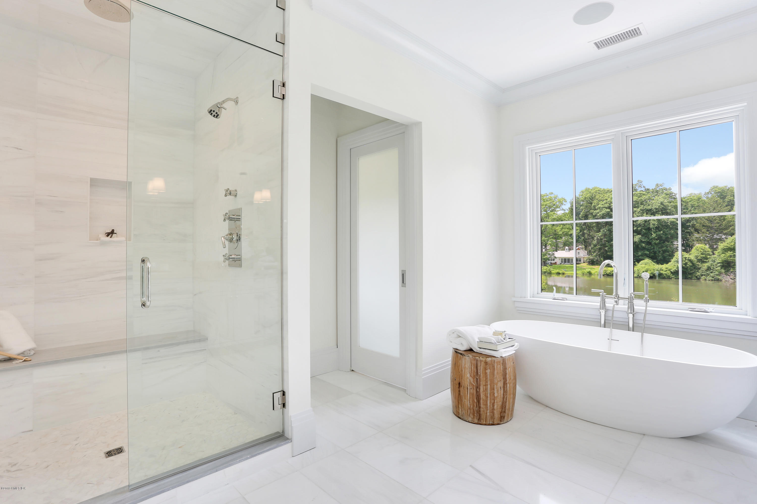 38 Birch Lane Greenwich, CT 06830 - Photo 19 of 31 a bathroom with a tub a shower and a sink