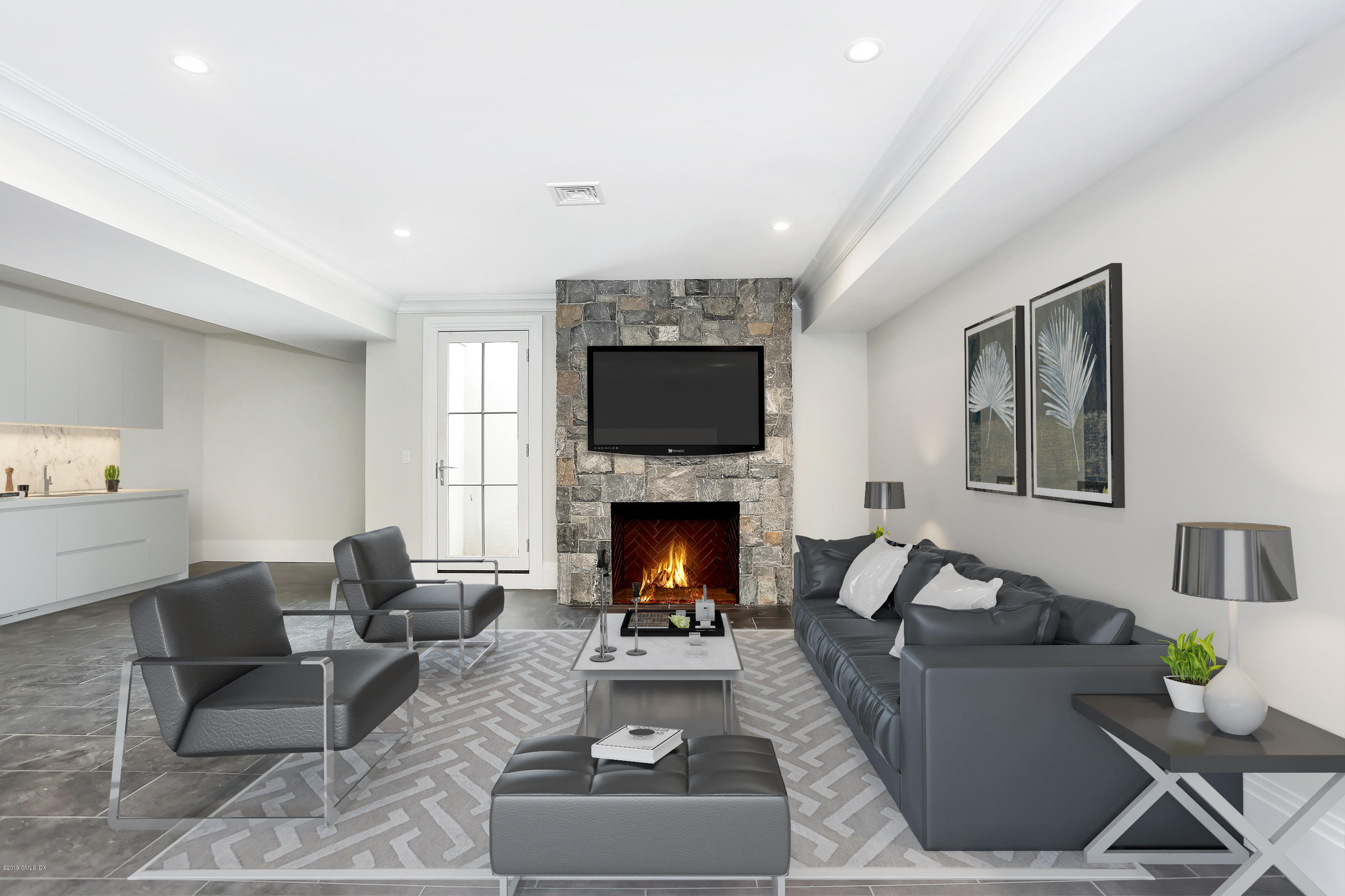 38 Birch Lane Greenwich, CT 06830 - Photo 21 of 31 a living room with furniture and a fireplace