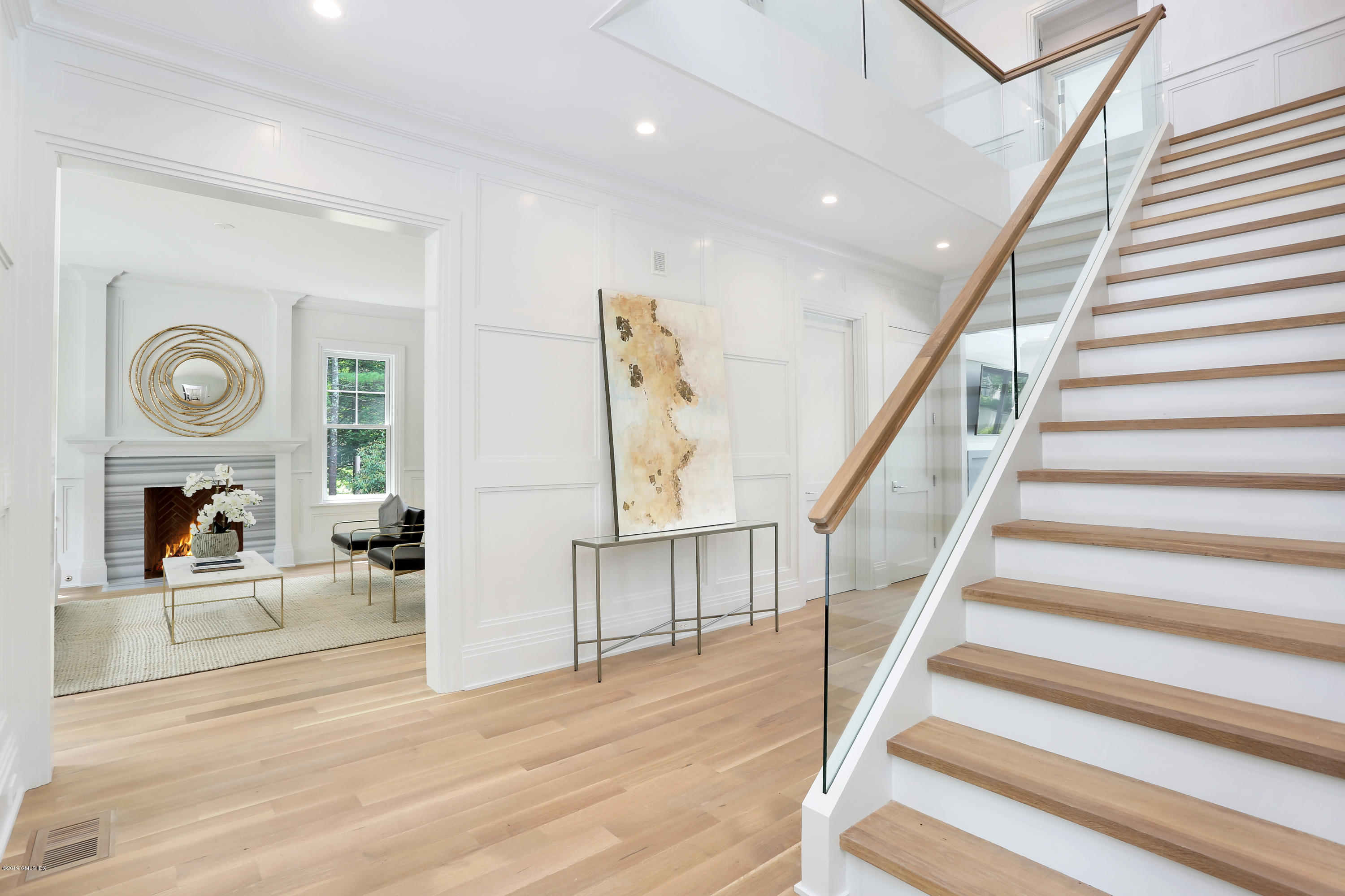 38 Birch Lane Greenwich, CT 06830 - Photo 3 of 31 a view of entryway and hall with wooden floor