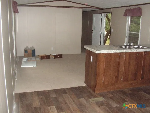 a view of bathroom with bathtub and shower