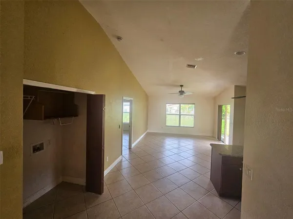 a view of hallway with windows