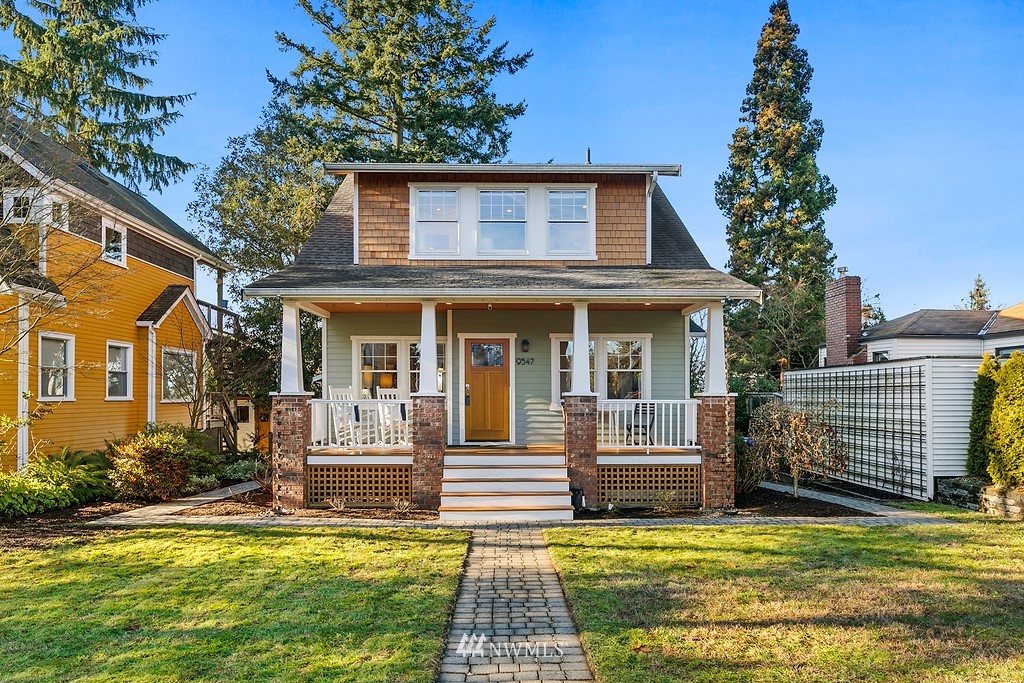 9547 Phinney Avenue North Seattle, WA 98103 - Photo 1 of 33 a view of a house with swimming pool and sitting area