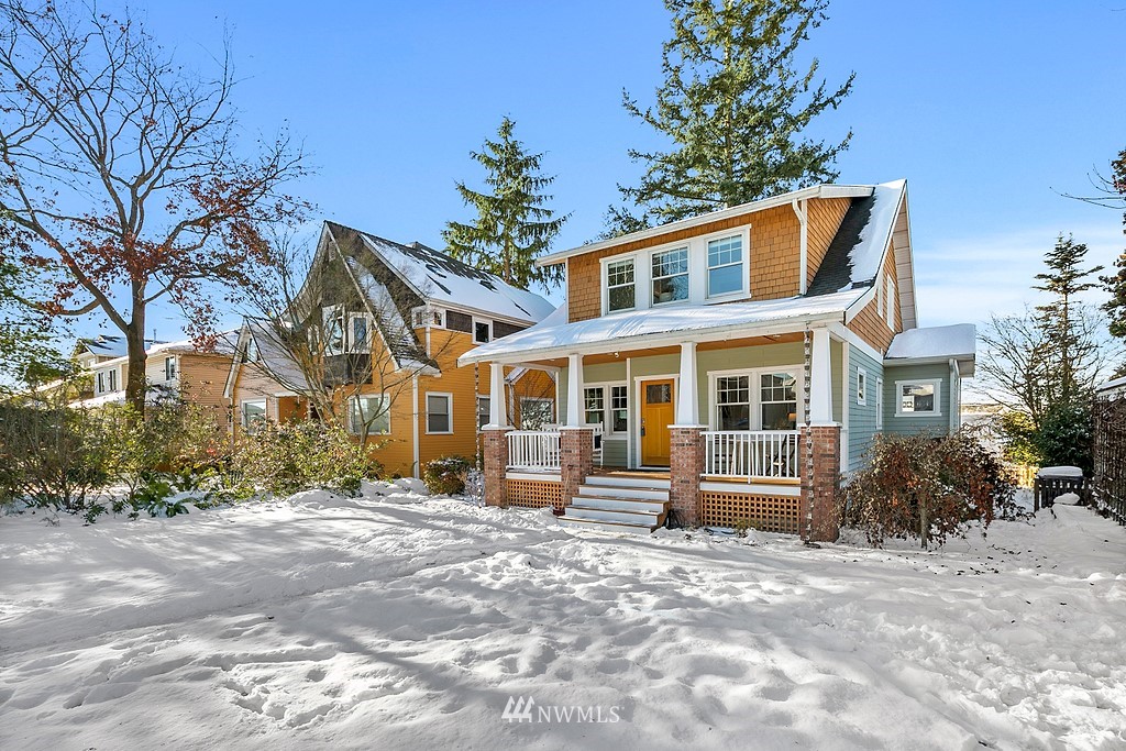 9547 Phinney Avenue North Seattle, WA 98103 - Photo 29 of 33 a front view of a house with a yard