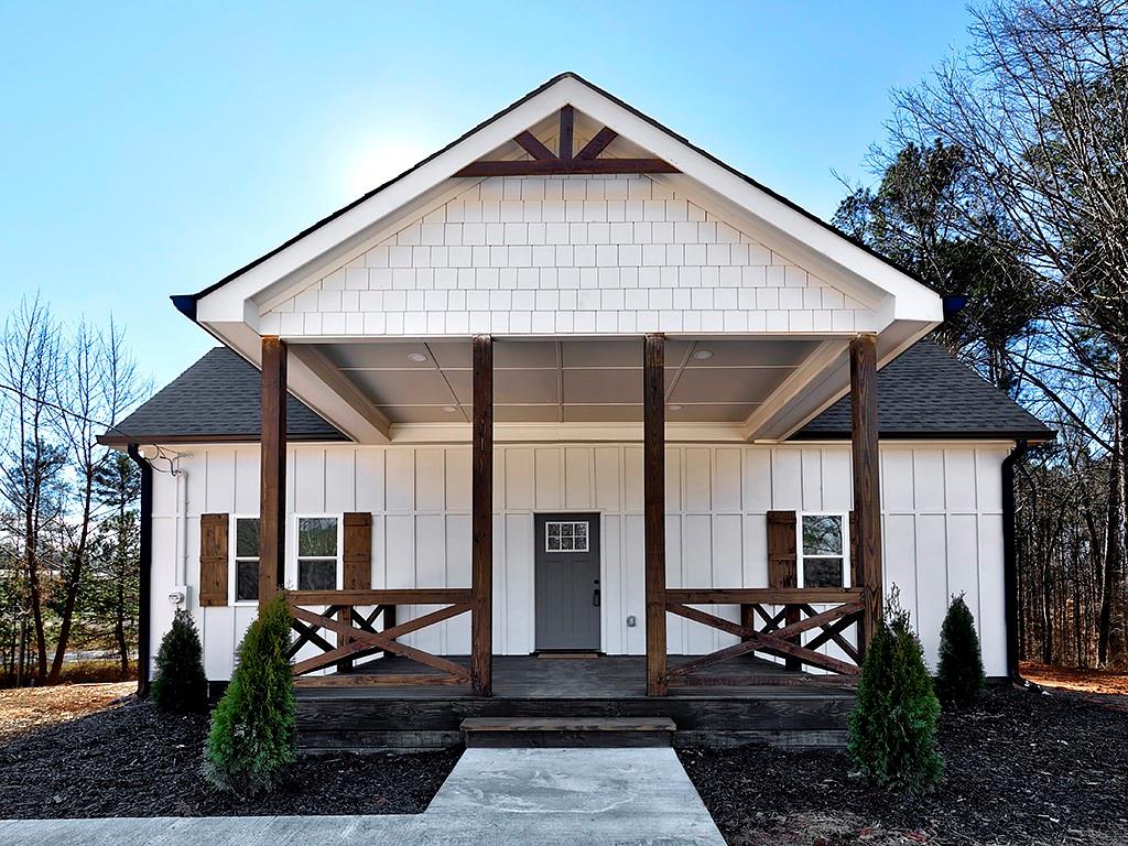 7043 Nebo Road Hiram, GA 30141 - Photo 1 of 1 a front view of a house with garden