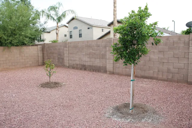 a house with a tree in the background