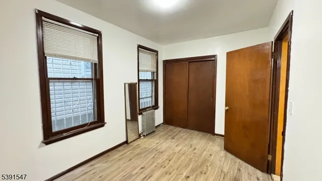 a view of hallway with natural light