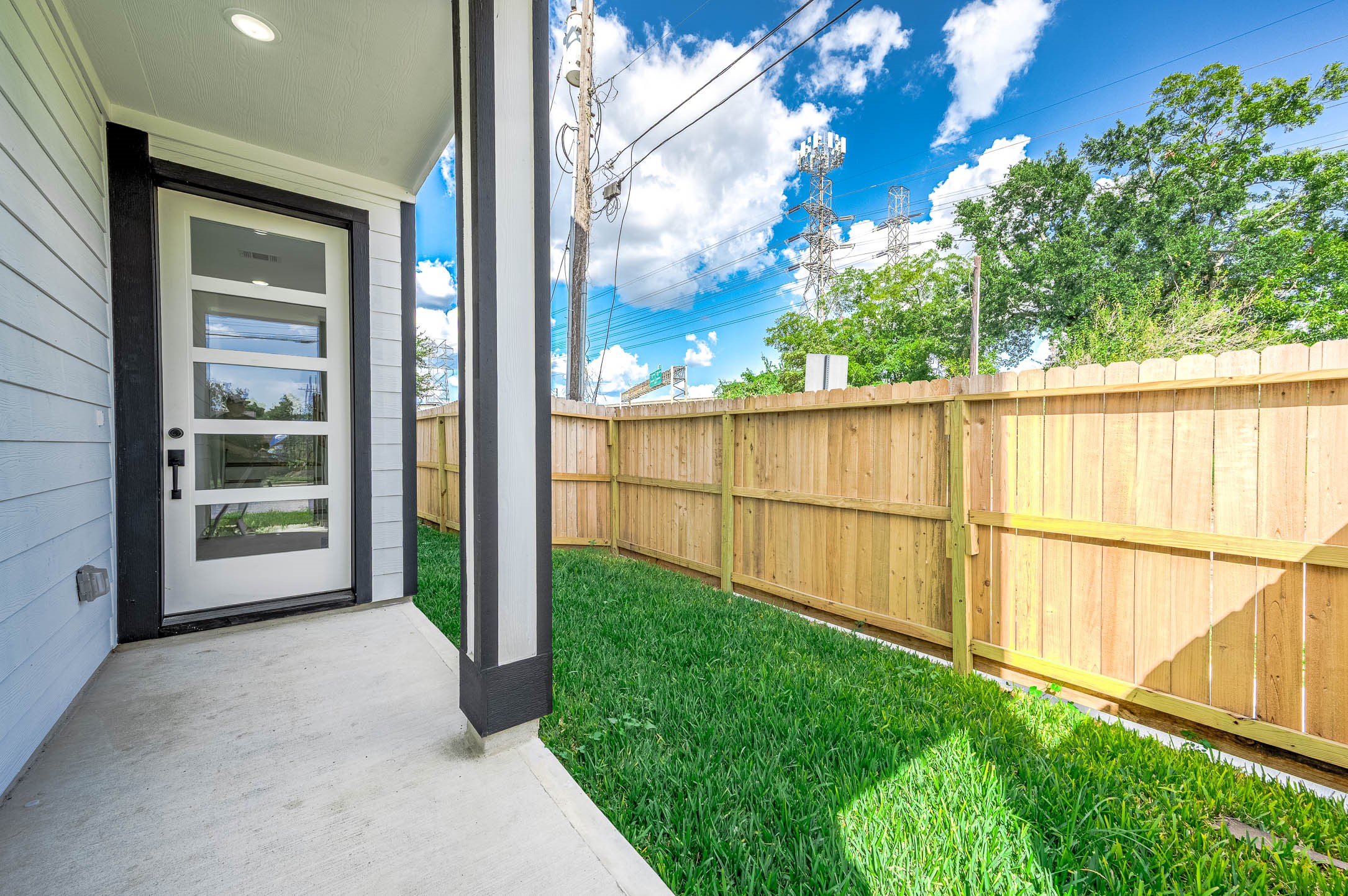 1515 Euel Street Houston, TX 77009 - Photo 6 of 34 Fenced backyard space with lush green grass—perfect for pets, outdoor lounging, or creating your own private outdoor retreat.