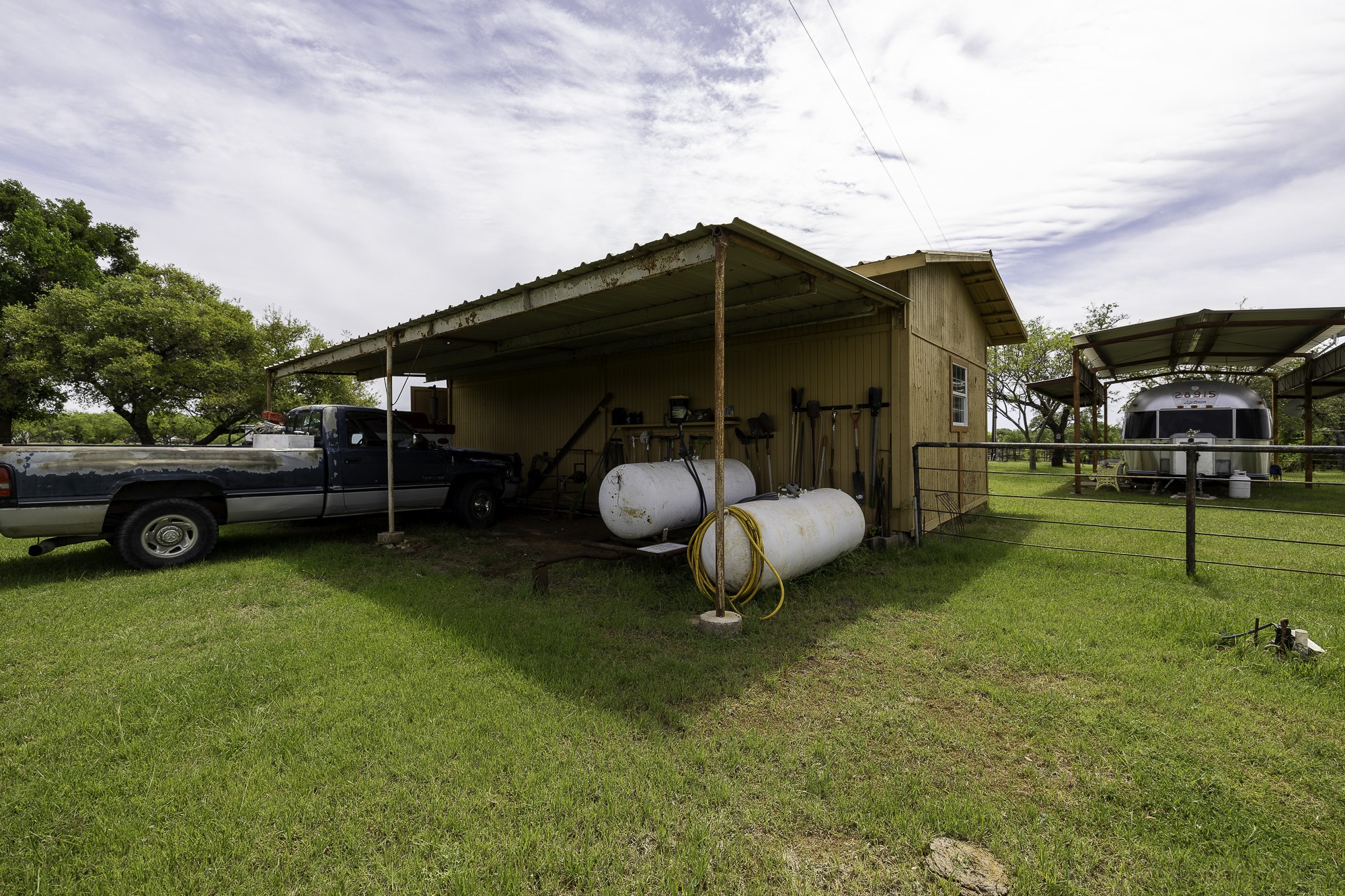 525 Jack Rabbit Circle Zephyr, TX 76890 - Photo 20 of 37 a view of a backyard with table and chairs