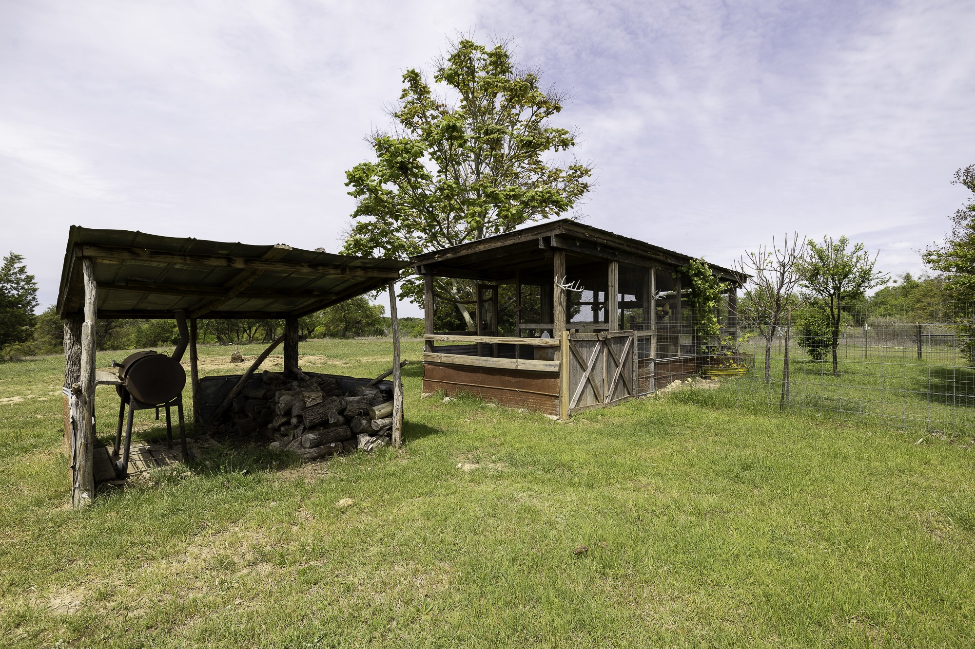 525 Jack Rabbit Circle Zephyr, TX 76890 - Photo 22 of 37 a backyard of a house with table and chairs