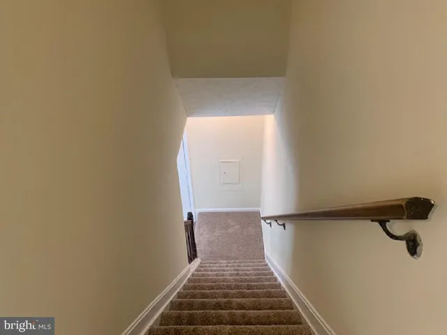 a view of swimming pool from a balcony